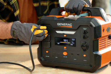 Generac portable generator being used to a power DIY project outside